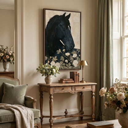 a cozy living room with a large black horse painting on the wall, a wooden console table with books and a vase of flowers, and a green armchair.