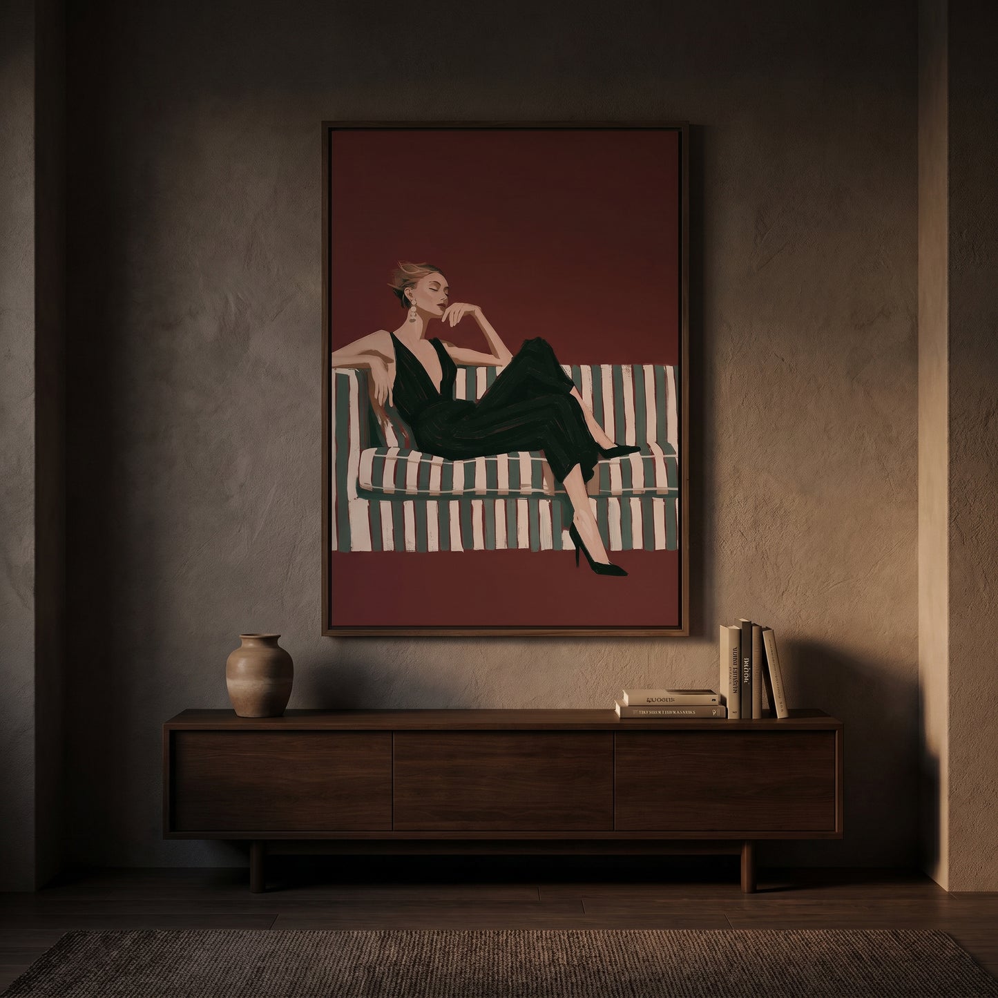 a woman sitting on a striped couch, with a wooden cabinet below the painting and a vase on the cabinet.