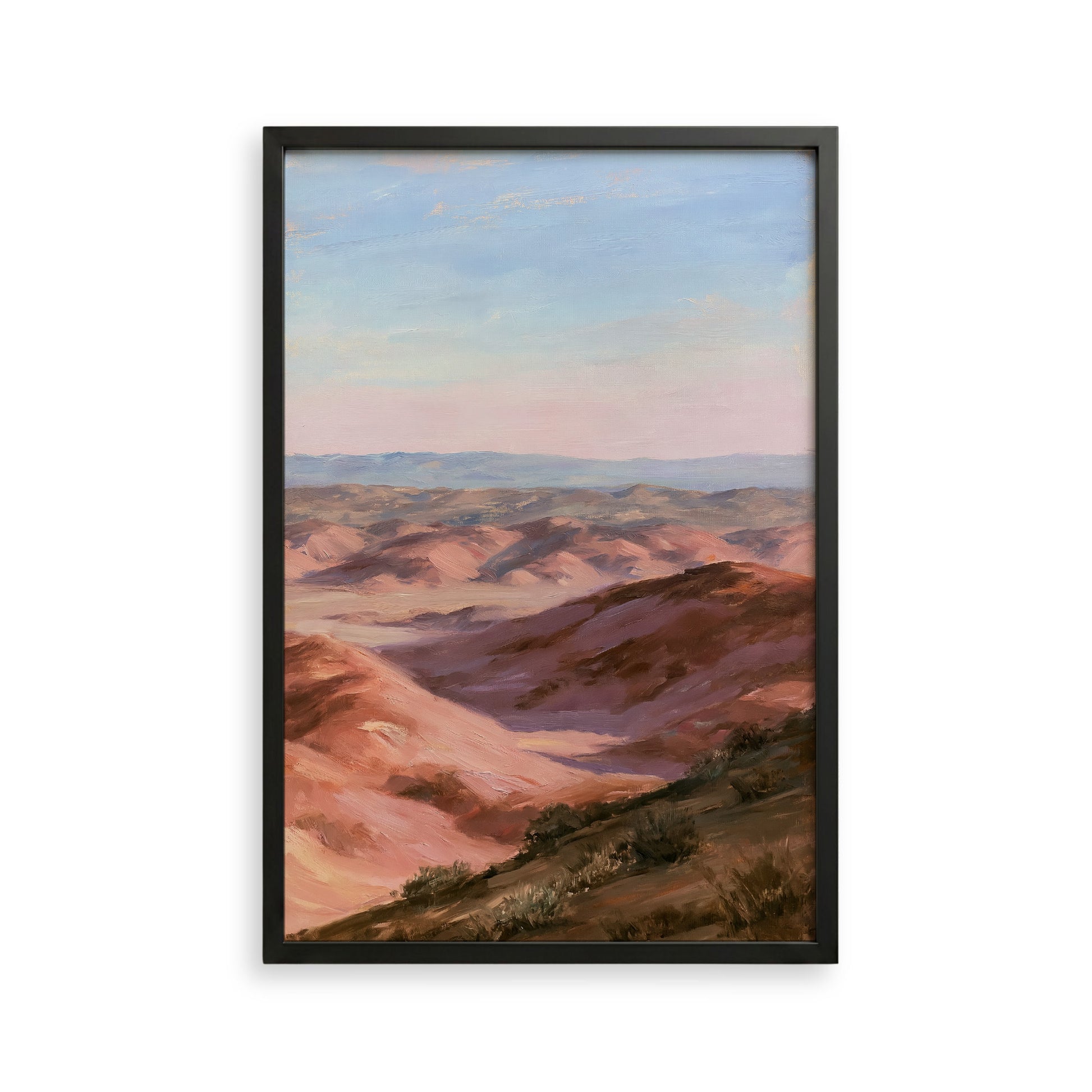 The image is a framed painting depicting a scenic landscape with rolling hills and a clear blue sky.