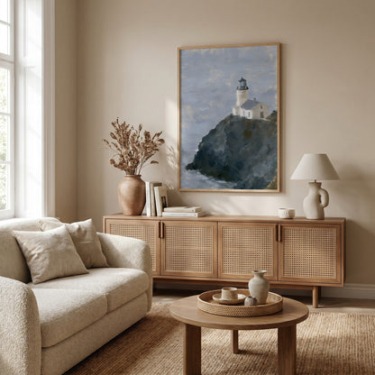 a cozy living room with a large painting of a lighthouse on the wall, a wooden cabinet, a beige sofa, and a round coffee table.