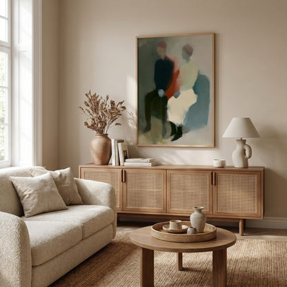 a cozy living room with a beige sofa, a wooden sideboard, and a large abstract painting hanging on the wall.