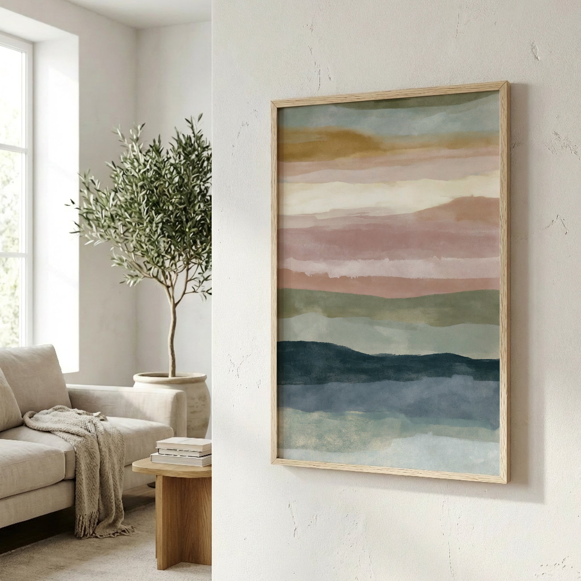 a living room with a large abstract painting hanging on the wall, a comfortable couch, and a potted plant.