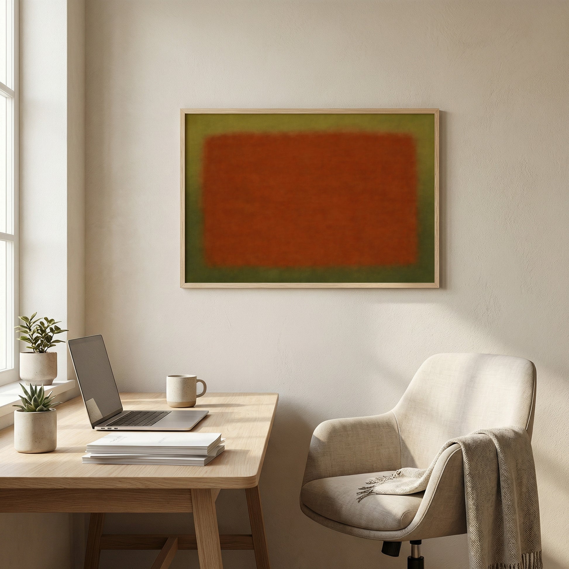Minimal abstract rust and olive wall art in a clean home office setting