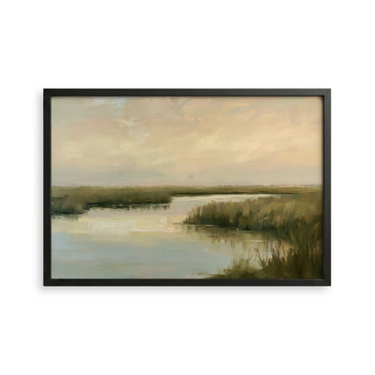 The image is a framed painting depicting a serene landscape with a body of water, grassy banks, and a cloudy sky.
