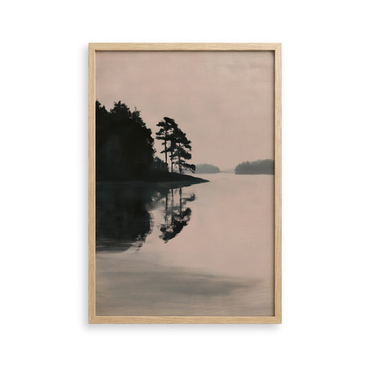 a serene landscape with a calm lake reflecting the surrounding trees and sky.