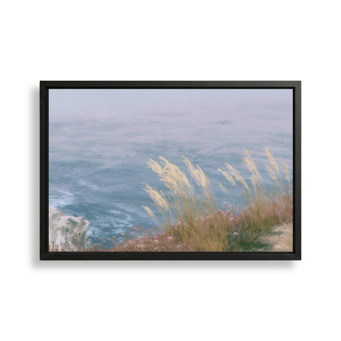 A framed painting depicting a serene coastal landscape with a rocky cliff overlooking the ocean.