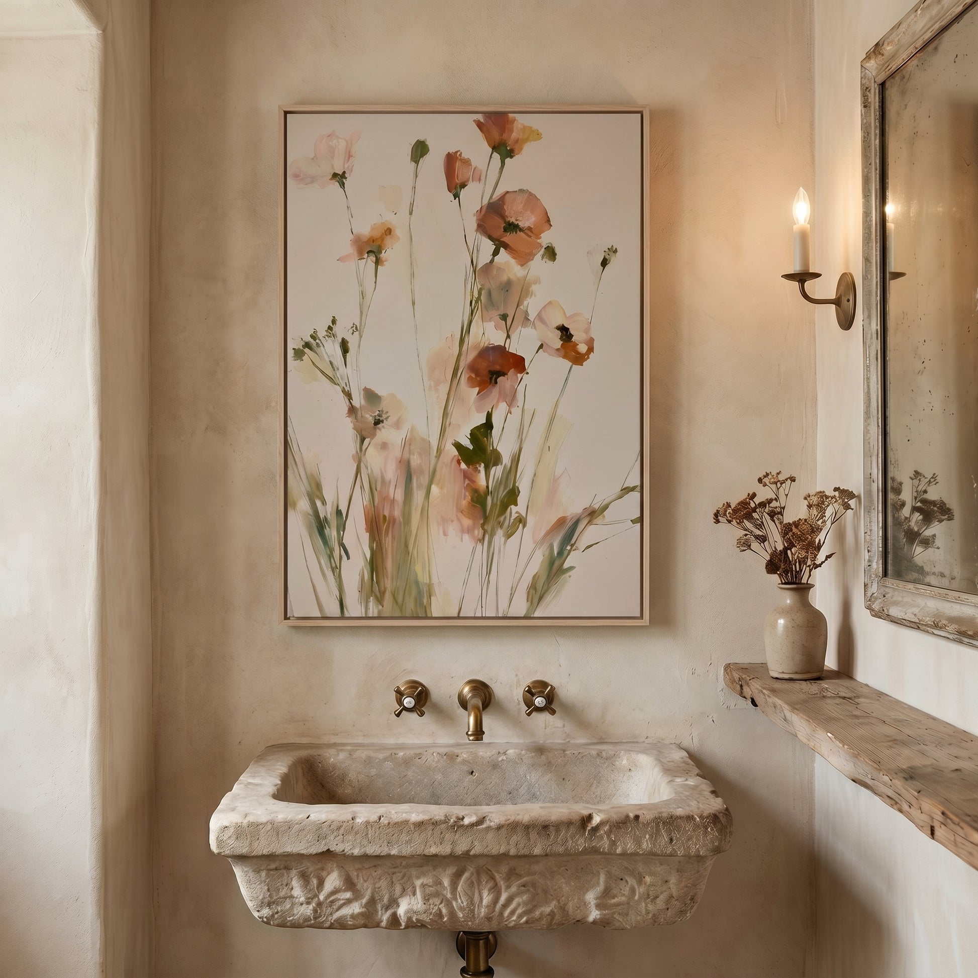 a bathroom with a stone sink, a framed painting of flowers above it, and a mirror on the wall.