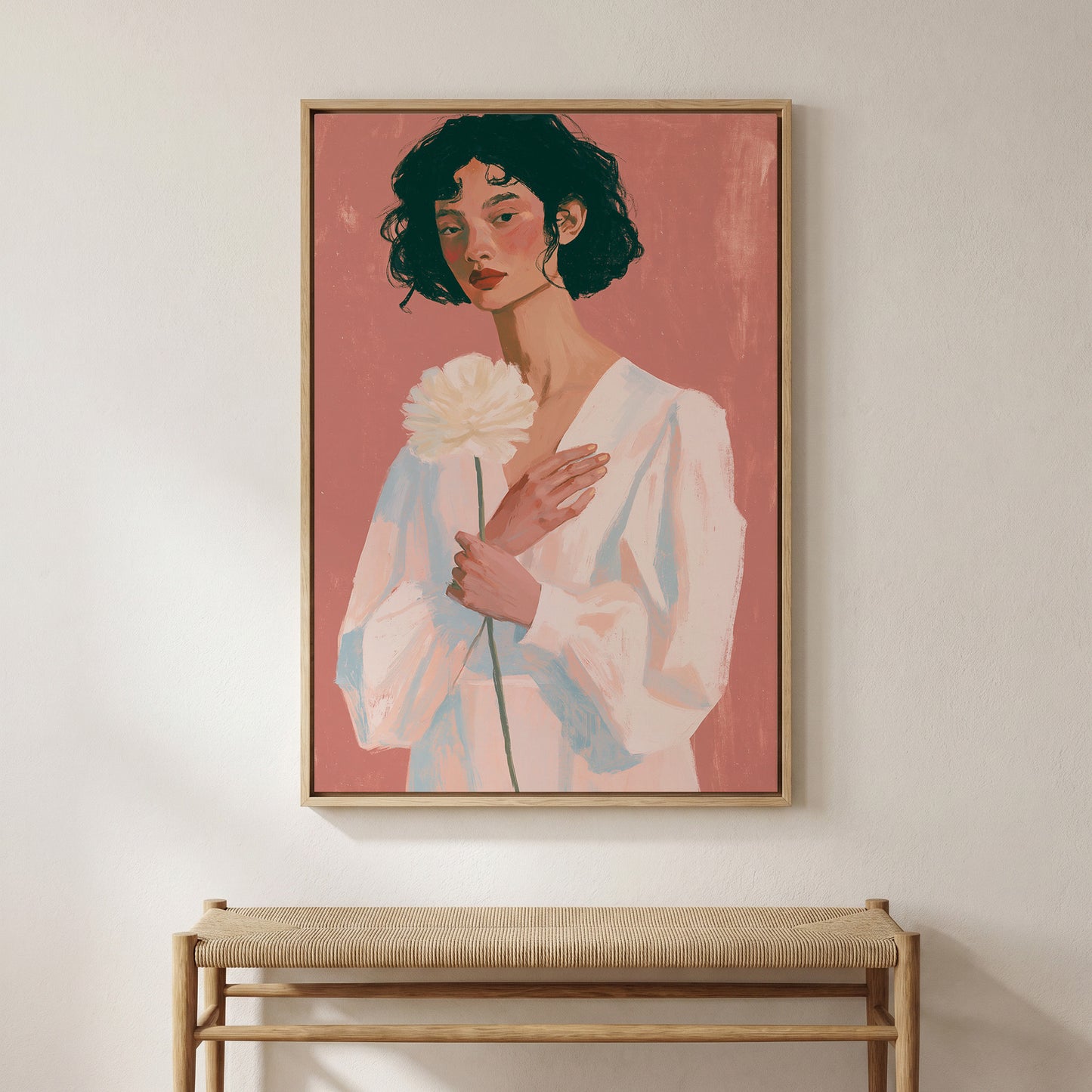 a woman holding a white flower in her hand.