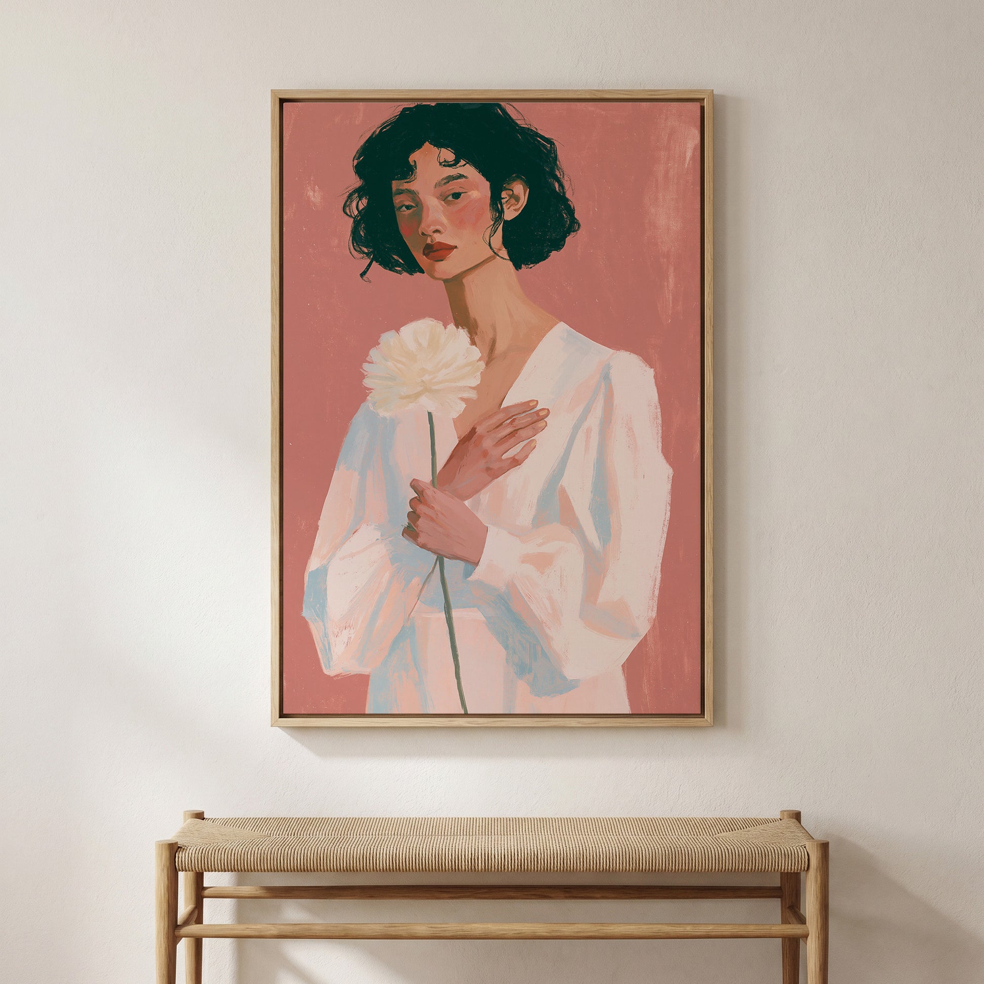 a woman holding a white flower in her hand.
