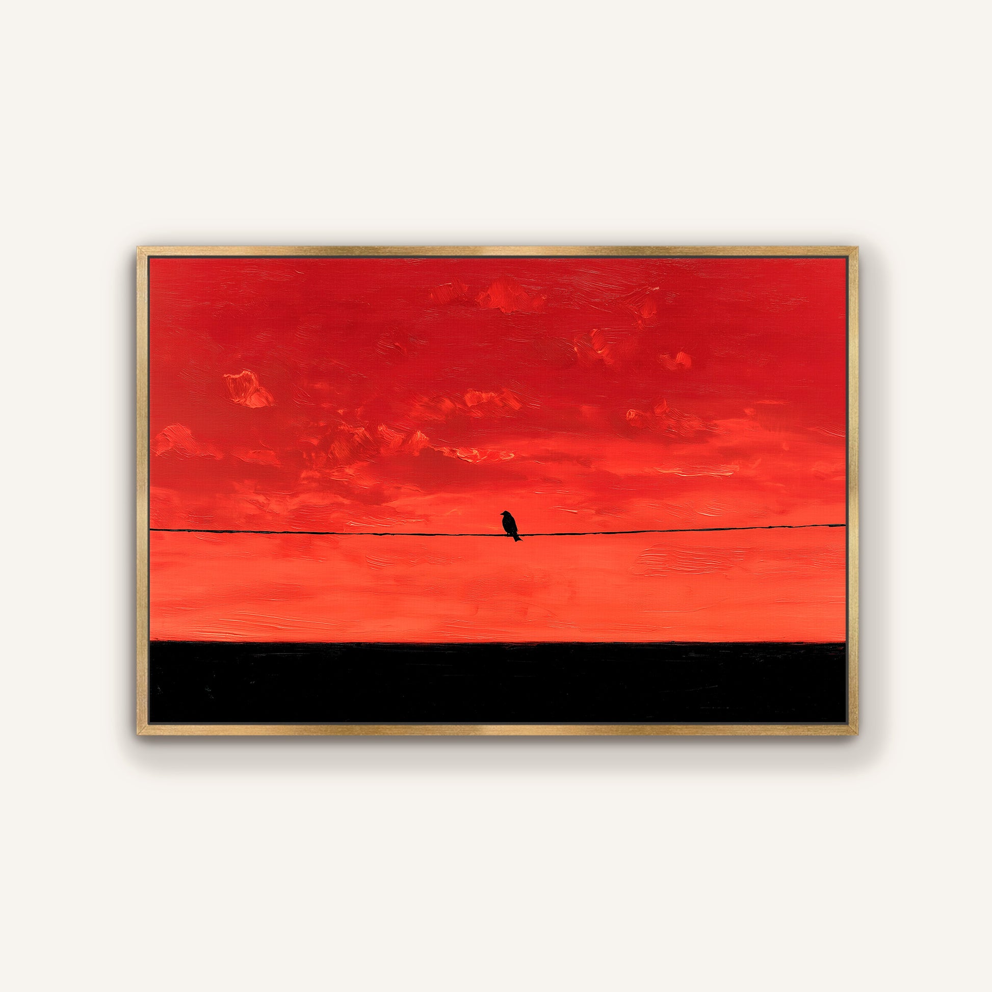 A lone bird perched on a wire against a vibrant red sky.