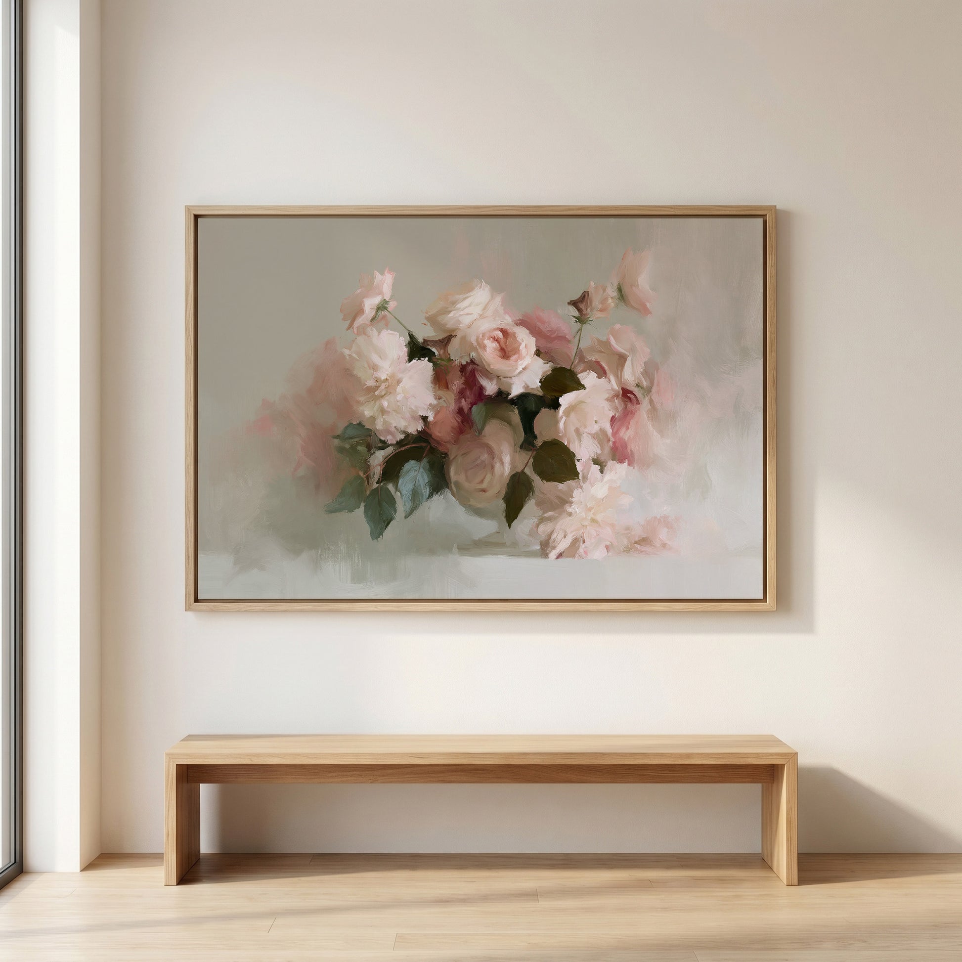 a large painting of pink flowers hanging on a wall above a wooden bench.