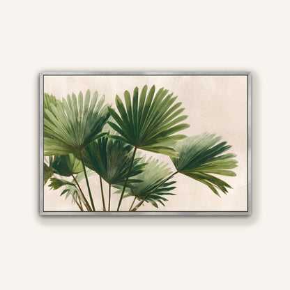 A framed image of a group of green palm leaves against a light background.