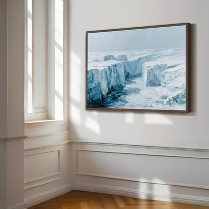 a large, framed painting of a snowy, icy landscape hanging on a white wall.
