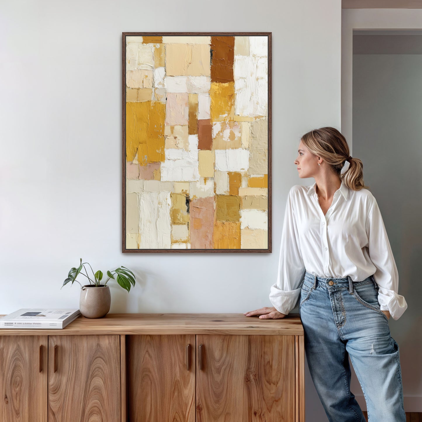Large abstract wall painting with geometric texture displayed in living room.