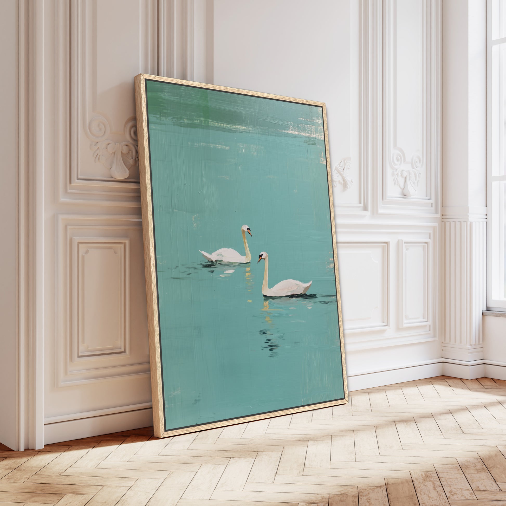 Oversized Evara swan lake canvas in gold frame leaning on classic white wall, Parisian interior styling.