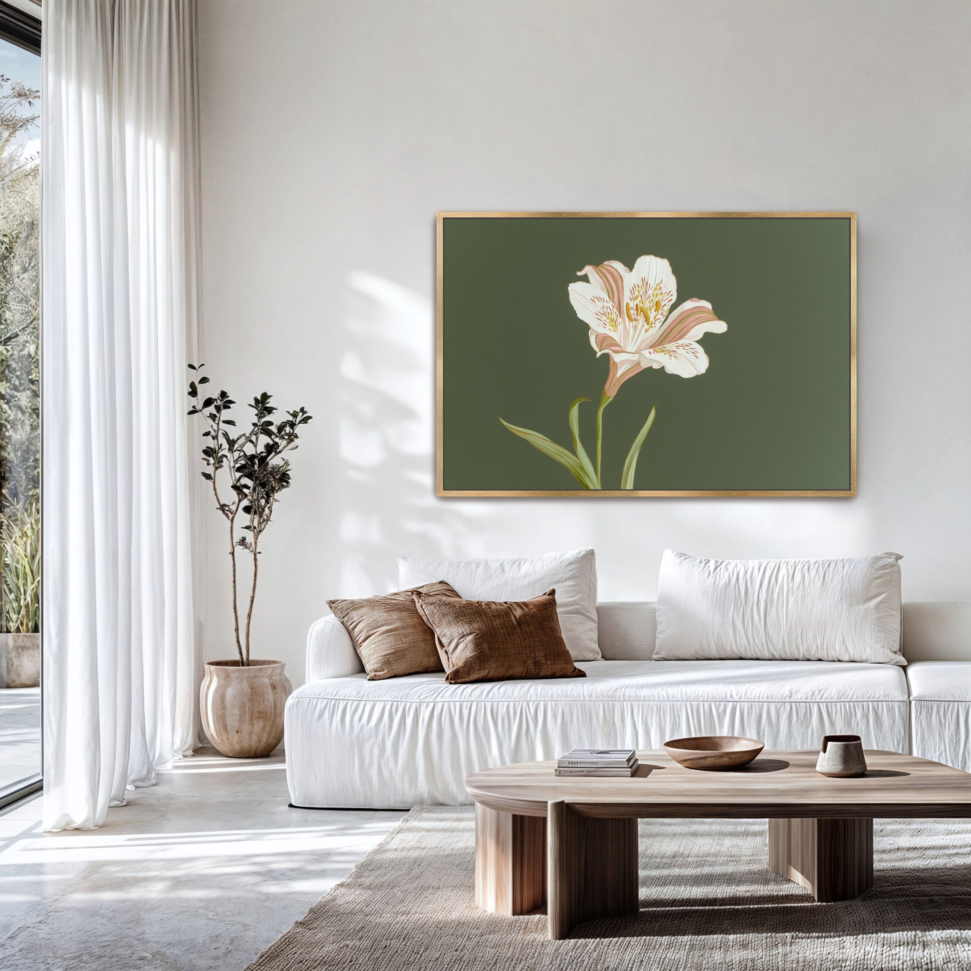 White lily floral wall art on green canvas styled in modern neutral living room with wood coffee table