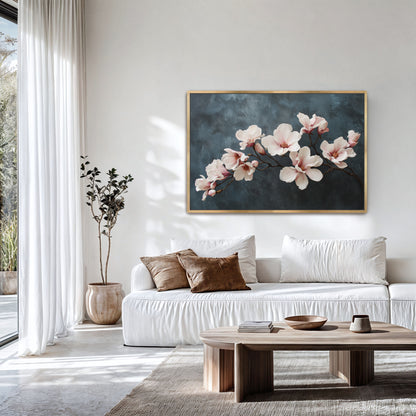 Living room with a painting of flowers on the wall, a white sofa, and a wooden coffee table.