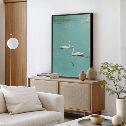 Large Evara swan lake artwork hung on modern living room wall.
