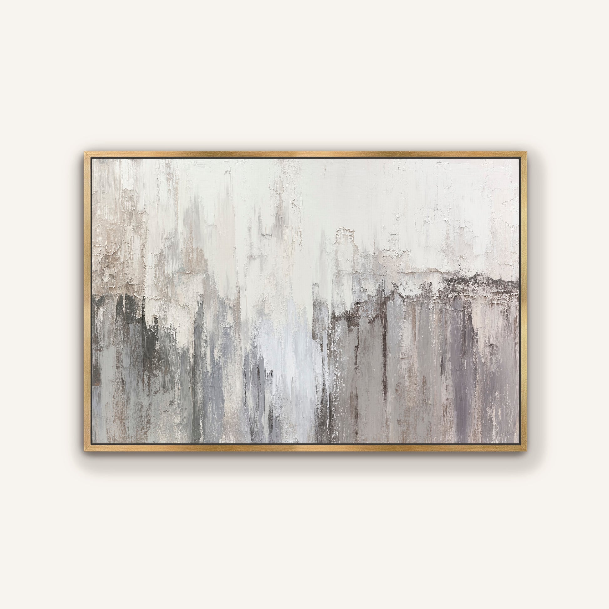 Close-up of neutral abstract wall art with gold frame