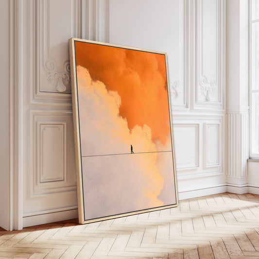 Elegant white room with herringbone floors featuring large orange and cream abstract cloud artwork framed in gold leaning on wall.
