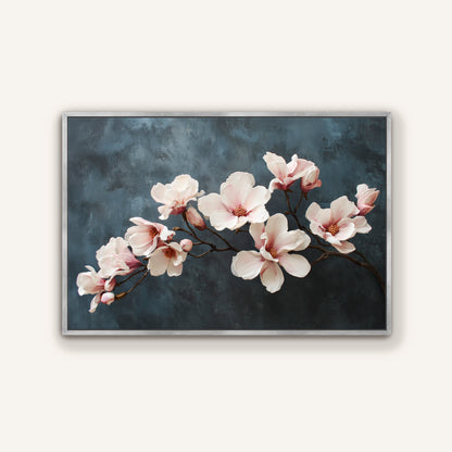 Magnolia floral canvas in silver frame with elegant ivory and blush flowers.