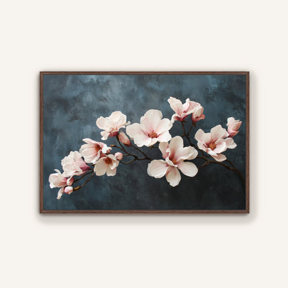 Magnolia branch wall art in dark espresso frame with ivory flowers.
