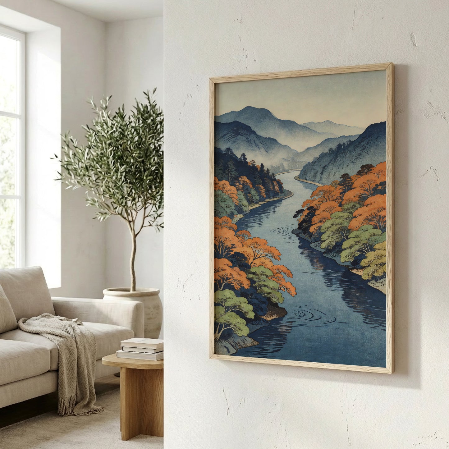 Japanese woodblock style river print in bright living room corner