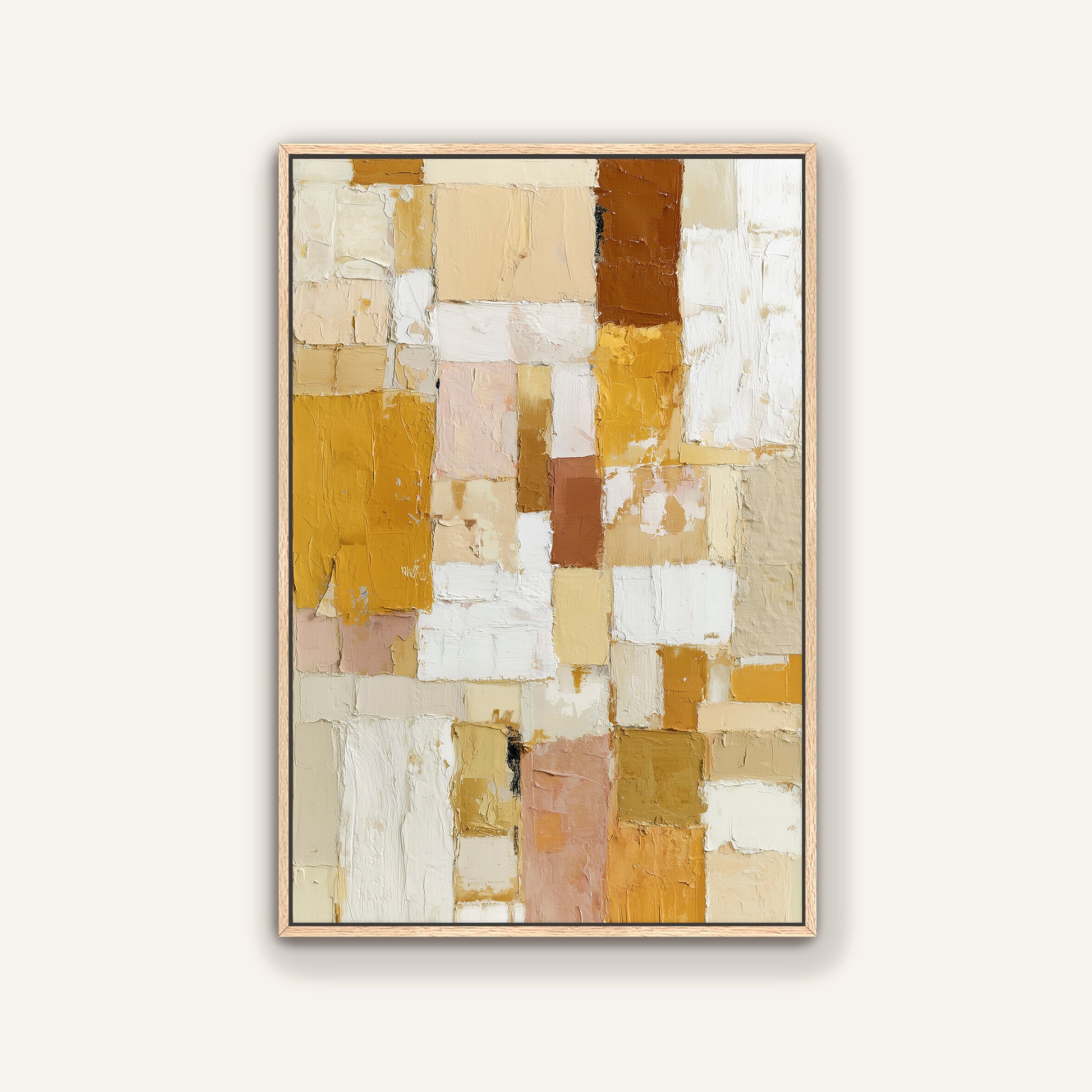 Modern abstract wall art with mustard and gold textured blocks on canvas, framed in light oak.