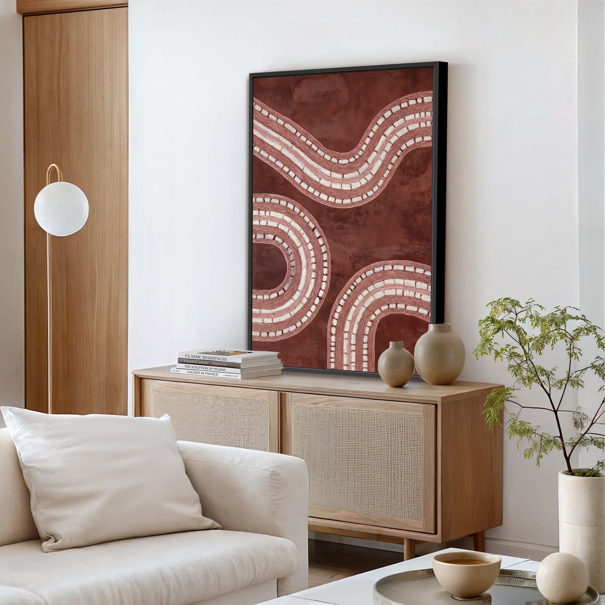 Modern minimalist burgundy red abstract print in living room.