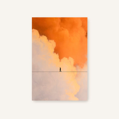 Fine art canvas print of a solitary figure walking a tightrope between orange and beige clouds with no frame