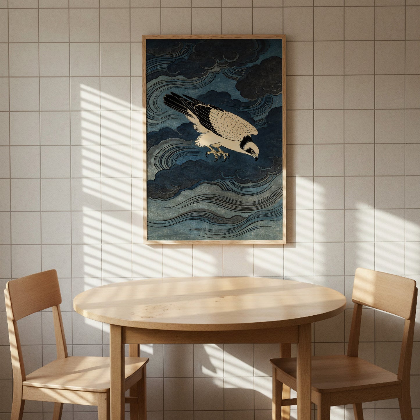 Storm Osprey Japanese woodblock bird print above dining table with sunlight