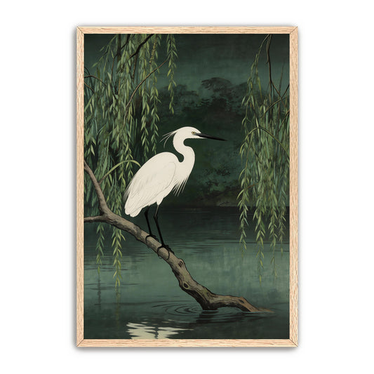 White heron perched on branch with willow leaves, dark green moody nature art print in natural wood frame
